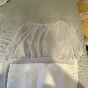 Jennifer Lopez XL crop top and skirt.